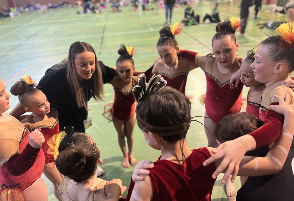 Young Aboriginal girls set to take part in calisthenics at a local stadium 