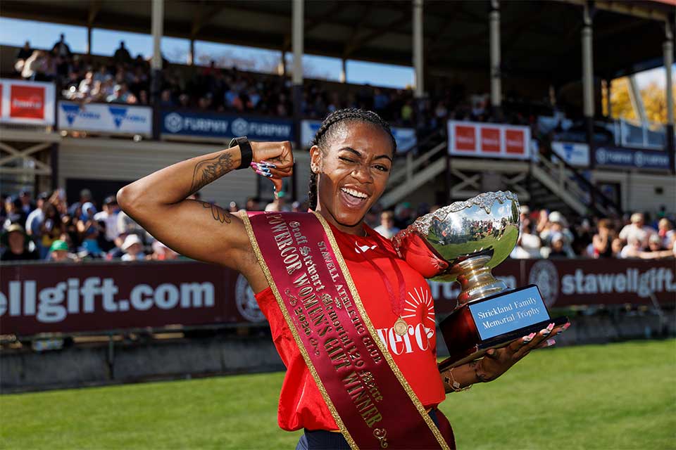 US sprinter Sha&rsquo;Carri Richardson flexes while wearing the winner&rsquo;s sash after taking out the Women&rsquo;s Gift.