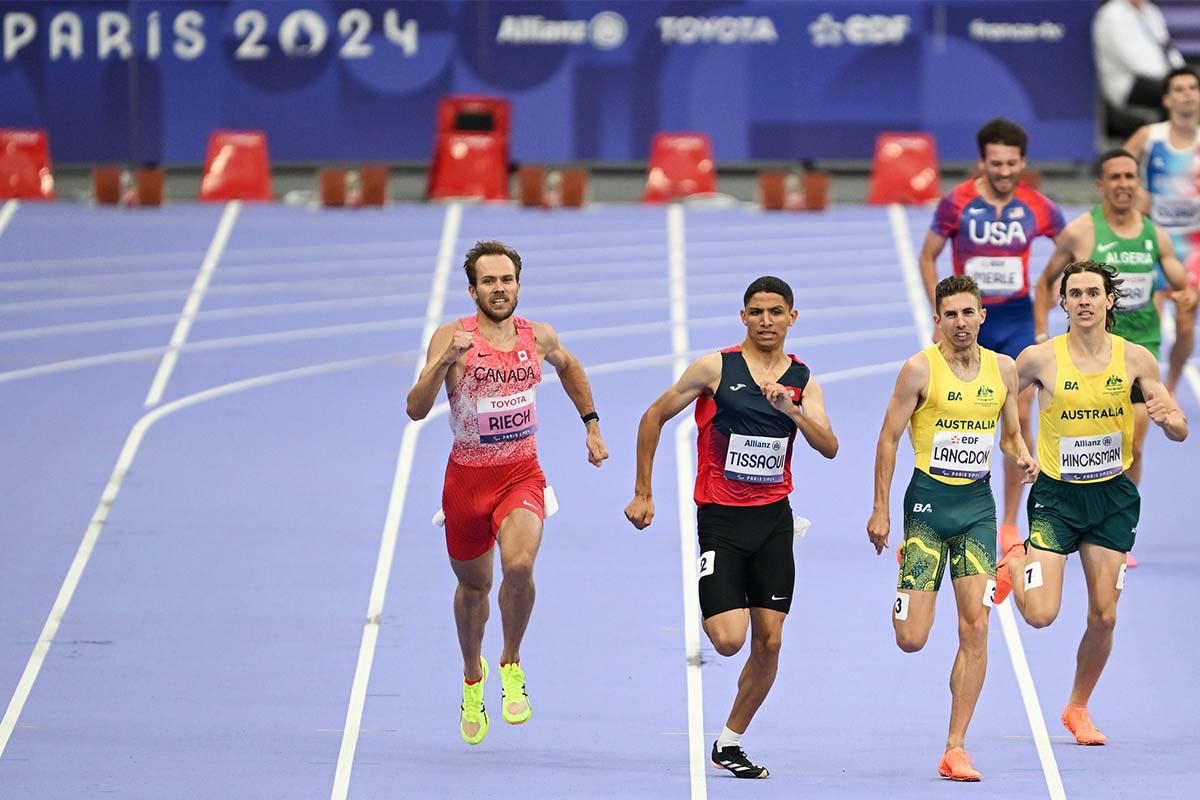 Reece and other athletes charging down the home stretch at Paris.