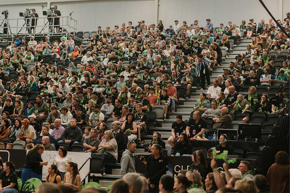The crowd watches the game from the stands at GRISS>