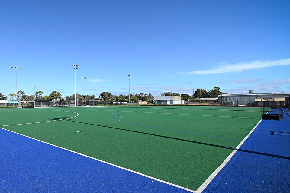 A playing field at Stead Park Geelong with portable hockey goals set up at either end.