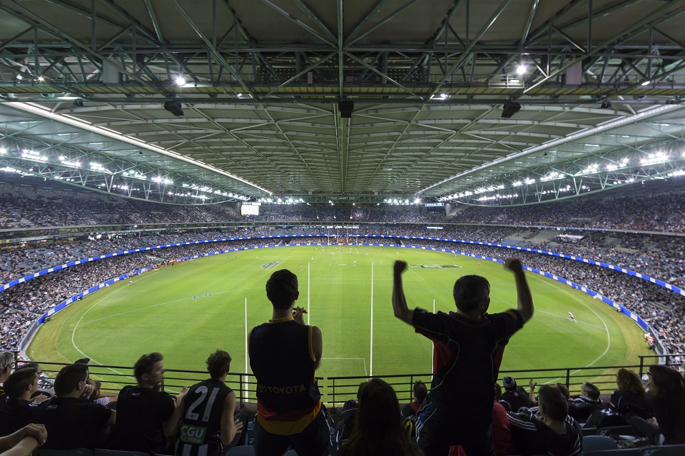 AFL Football fans enjoying a night game