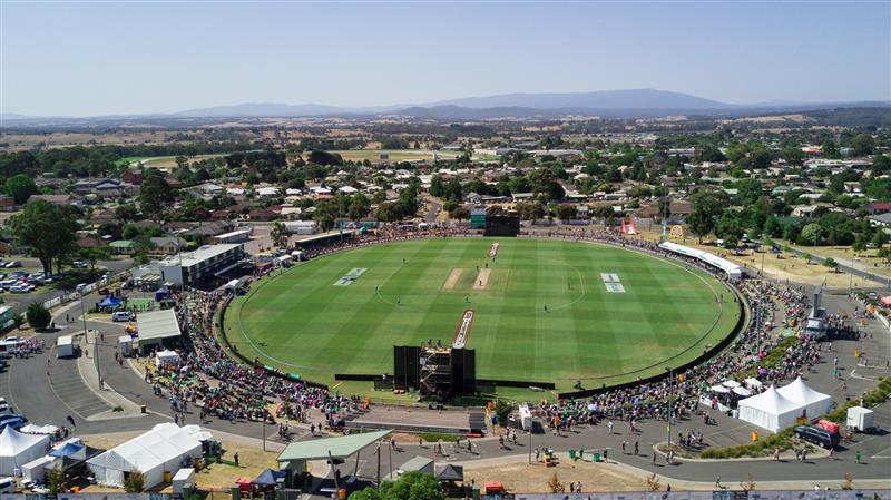 An aerial view of Ted Summerton Reserve showing people watching a cricket match.