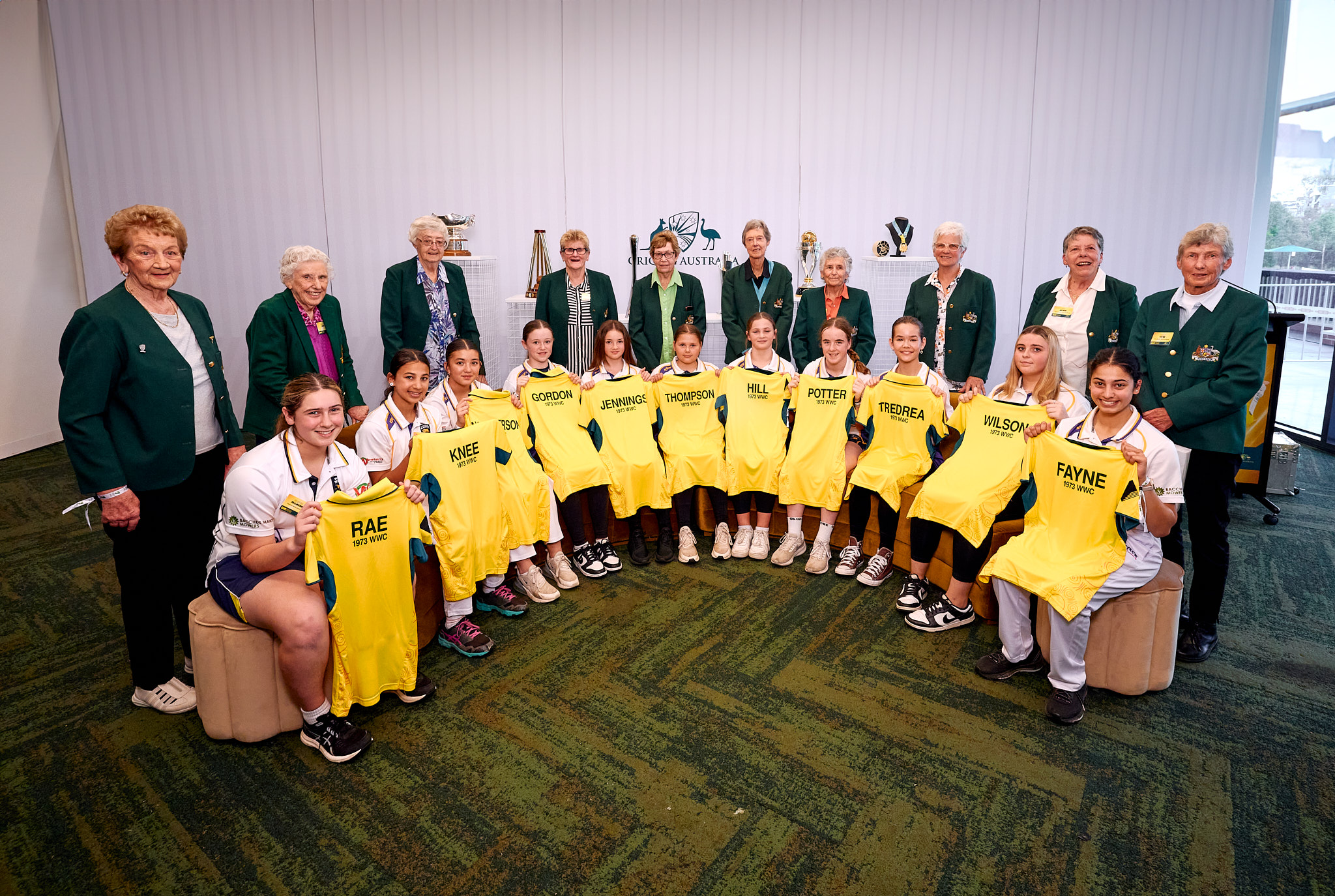The 1973 Australian women's World Cup team with junior crickters
